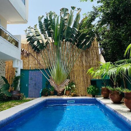 L'Oasis Guesthouse Cotonou Bagian luar foto
