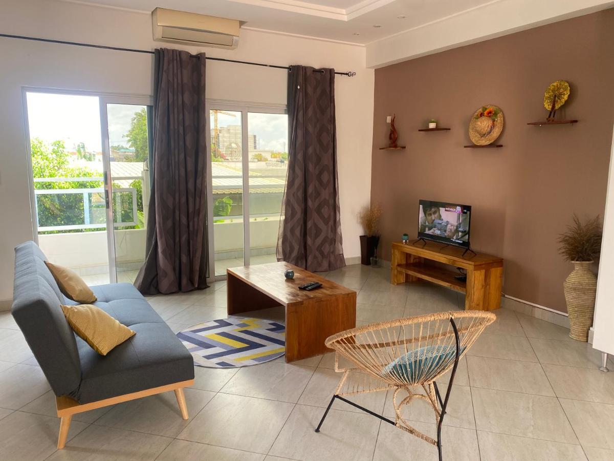 L'Oasis Guesthouse Cotonou Bagian luar foto