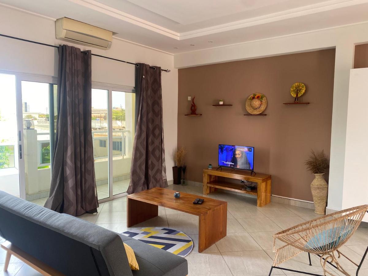 L'Oasis Guesthouse Cotonou Bagian luar foto