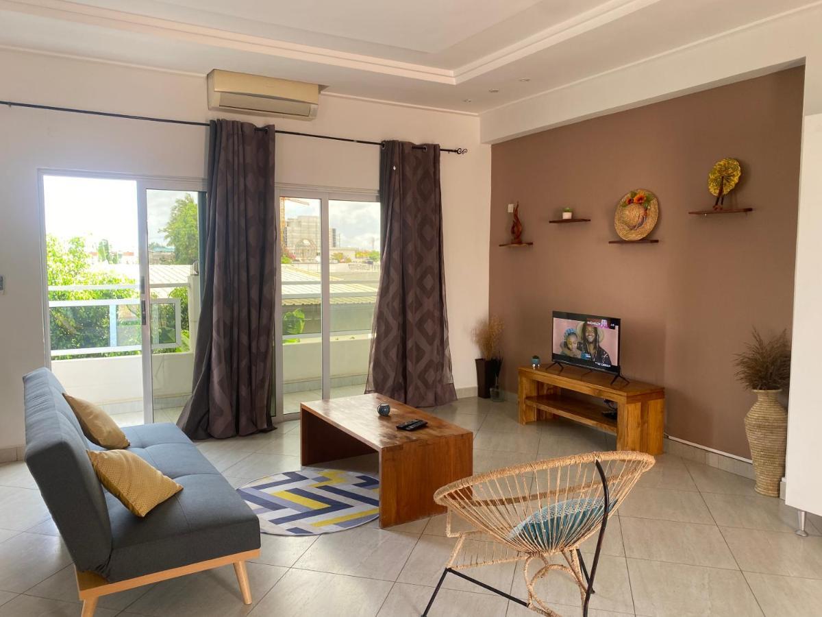 L'Oasis Guesthouse Cotonou Bagian luar foto