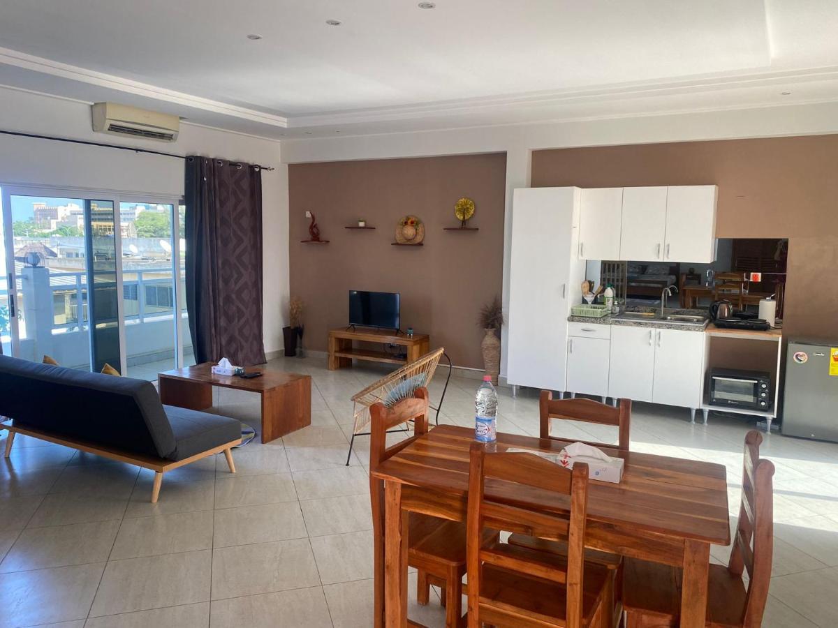 L'Oasis Guesthouse Cotonou Bagian luar foto