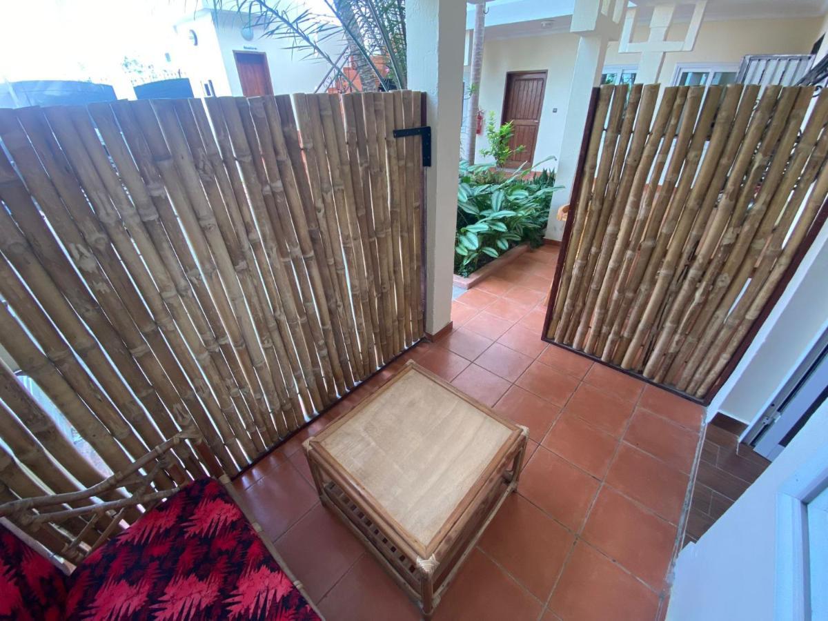 L'Oasis Guesthouse Cotonou Bagian luar foto