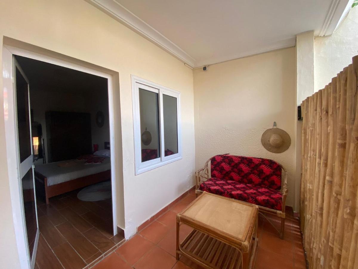 L'Oasis Guesthouse Cotonou Bagian luar foto