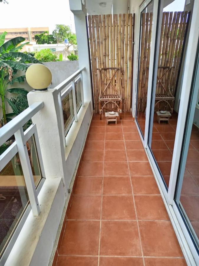 L'Oasis Guesthouse Cotonou Bagian luar foto