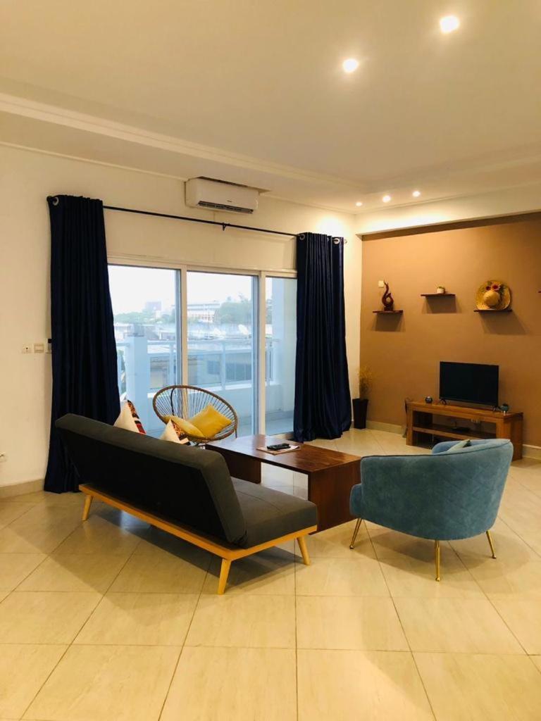 L'Oasis Guesthouse Cotonou Bagian luar foto