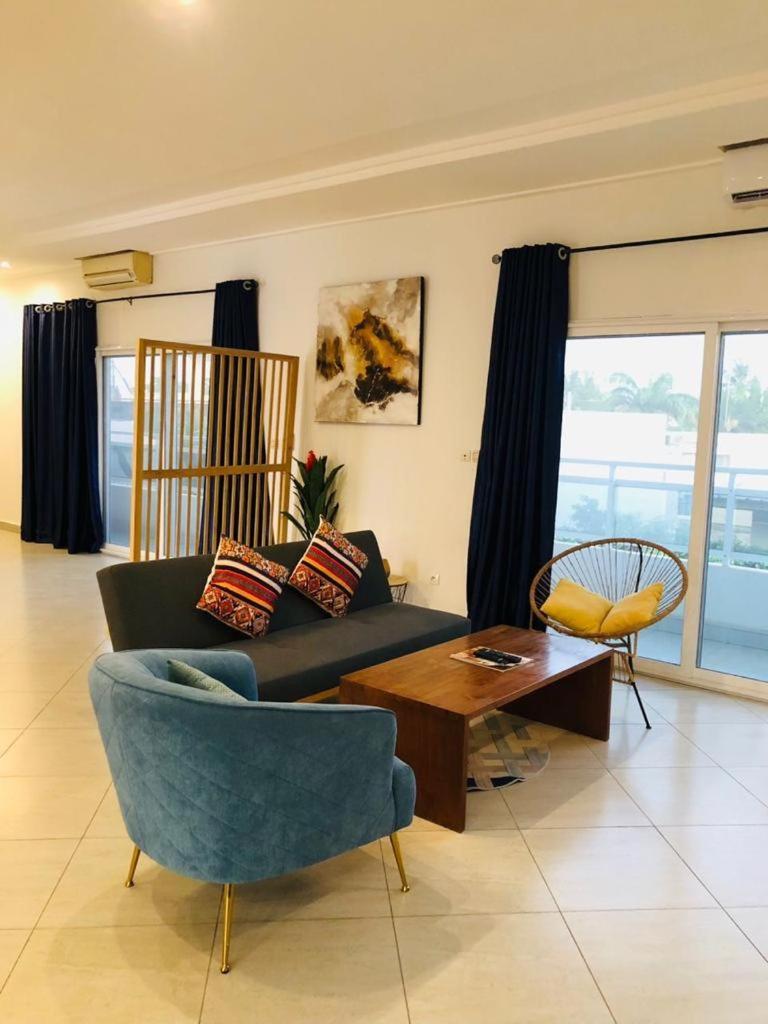L'Oasis Guesthouse Cotonou Bagian luar foto