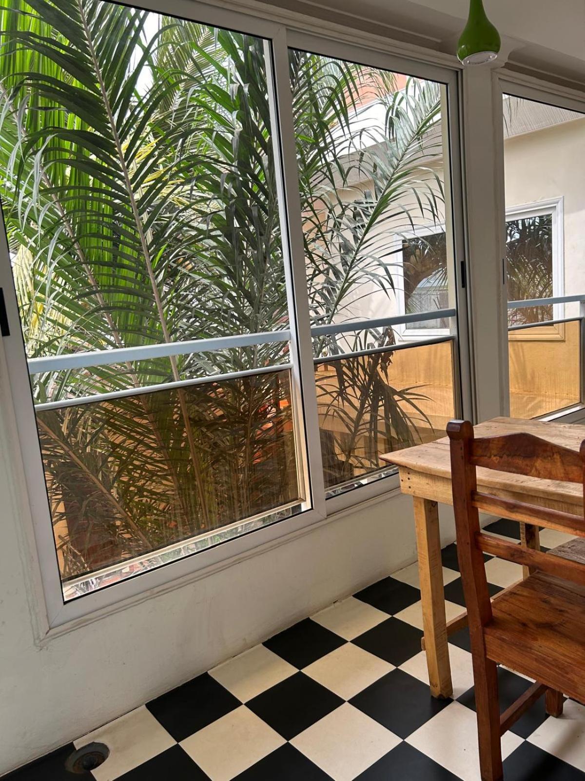 L'Oasis Guesthouse Cotonou Bagian luar foto